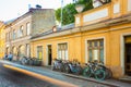 Tallinn, Estonia. Bicycles Rental Bikes Parking Near Old House In Old Part Town In Summer Evening.