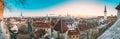 Tallinn, Estonia, Europe. Natural Night Starry Sky Above Tallinn Skyline Cityscape. Old Town And Modern City. Popular Royalty Free Stock Photo