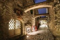 Tallinn, Estonia, Europe. St. Catherine's Passage At Winter Evening In Night Illuminations. Narrow Medieval Street