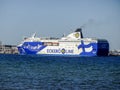 Eckero Line white and blue ferry ship arriving to the port.