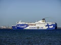 Eckero Line white and blue ferry ship arriving to the port.