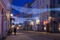 TALLINN, ESTONIA - JANUARY 12, 2018: Night picturesque winter view of the old streets with Christmas decoration in the historical Royalty Free Stock Photo