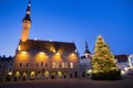 TALLINN, ESTONIA - JANUARY 12, 2018: Night view of the Christmas tree near medieval The Tallinn Town Hall. Built in XIV century Royalty Free Stock Photo