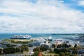 TALLINN, ESTONIA - JULY 22, 2015: Aerial panoramic view of Tallinn old town city center and port with big cruise ships on cloudy Royalty Free Stock Photo