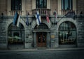 Tallinn, Estonia - July 7, 2019: The entrance to Hestia Hotel Barons decorated with flags above it