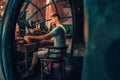 Young man reading a book in a fairytale submarine.