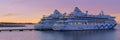 Tallinn, Estonia -march 05, 2022: AIDA Cruise ship at sunset time in harbour. AIDA luxury liner at wonderful evening