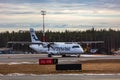 Tallinn, Estonia - March 23, 2021: finnair plane ATR 72-500 OH-ATE takes off from Airport of Tallinn