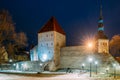 Tallinn, Estonia. Medieval Tower Neitsitorn At Winter In Evening Night Illuminations.UNESCO Famous Landmark. Destination