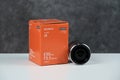 Tallinn, Estonia 11 09 2019: new sony macro lens 30mm f3.5. photo of lens with box Royalty Free Stock Photo