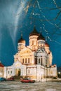 Tallinn, Estonia. Night Starry Sky Above Traditional Old Architecture Skyline In Old Town. Alexander Nevsky Orthodox