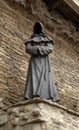 Tallinn, Estonia - November 05 2021: Iron sculpture of a monk in the Danish Royal Garden in Tallinn. Franciscan monk