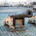Tallinn, Estonia - November 18, 2018: Old cannons in the Maritime Museum of Tallinn. Cannon on wooden gun carriages