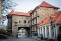 TALLINN, ESTONIA - November 02, 2019: The view of wall in the medieval old town. One of many entrances to the old town