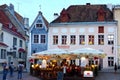 Tallinn ,Estonia 0,08,2019 Old Town Of Tallinn Viru Street cafe city life evening summer people walk relax and  sit in chair  cafe Royalty Free Stock Photo