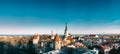 Tallinn, Estonia. Panorama Of Part Of Tallinn City Wall With Towers, At Top Of Photo There Is Tower Of Church Of St Royalty Free Stock Photo