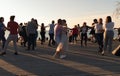 People relaxing and dancing Bachata on sunset at promenade on beach Baltic sea lifestyle scene weather forecast