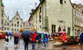 Tallinn Estonia rainy street people walking umbrellas travel to Europe tourist autumn street cafe town square coffee table old t