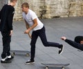 boy skateboarding on street training site