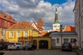 Tallinn, Estonia - 28 September 2022: Streets of old town with St. Olaf\'s church (Oleviste kirik) at background Royalty Free Stock Photo