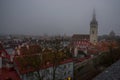 Tallinn, Estonia:St. Nicholas ` Church. Aerial cityscape with Medieval Old Town, Landscape with a panorama of the city in foggy an Royalty Free Stock Photo