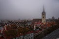 Tallinn, Estonia:St. Nicholas ` Church. Aerial cityscape with Medieval Old Town, Landscape with a panorama of the city in foggy an Royalty Free Stock Photo