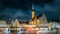 Tallinn, Estonia. Time-lapse Of Traditional Christmas Market And Carousel In Town Hall Square. Christmas Tree And Royalty Free Stock Photo