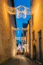 Tallinn, Estonia. View Of Raekoja Street In Christmas New Year Xmas Festive Illumination Lights