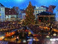 Tallinn  Holiday Travel ,Christmas Tree in town hall square old town snowflakes fall panoramic  best  market place blurred light Royalty Free Stock Photo
