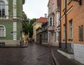 Tallinn old city street in dull, murky rainy evening Royalty Free Stock Photo