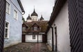 Tallinn old city street in dull, murky rainy evening Royalty Free Stock Photo