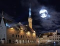 Tallinn old town  hall square at night light reflection in  puddles starry night medieval city travel to Estonia Royalty Free Stock Photo