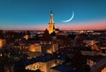 Tallinn old town panorama starry blue sky moon and pink sunset medieval city red ruffle capital city Estonia Baltic state