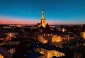 Tallinn old town panorama starry blue sky moon and pink sunset medieval city red ruffle capital city Estonia Baltic state Royalty Free Stock Photo