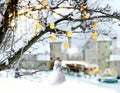 Snow man on winter street city park medieval street snowy winter white Christmas decoration travel to Est Royalty Free Stock Photo