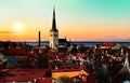 Tallinn old town  sunset  panorama on  medieval red roofs towers at evening sun light  travel to Estonia Royalty Free Stock Photo