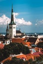 Scenic summer aerial panorama of the Old Town architecture in Tallinn, Estonia. View with traditional red tile roofs Royalty Free Stock Photo