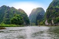 Tam Coc Natioanl Park - Vietnamese Girl traveling in boat along the Ngo Dong River at Ninh Binh Province, Trang An landscape Royalty Free Stock Photo