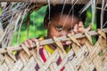 TAMAN NEGARA, MALAYSIA - MARCH 17, 2018: Indigenous baby in a village in Taman Negara national park, Malays
