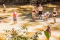 TAMAN NEGARA, MALAYSIA - MARCH 17, 2018: Tourists are swimming in a river in the jungle of Taman Negara national par