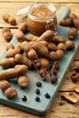 Tamarind fruit and drink on rustic table Royalty Free Stock Photo