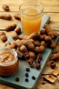 tamarind fruit and drink on rustic table Royalty Free Stock Photo