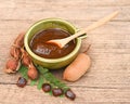 Tamarind set for health & Beauty treatment spa, hair, skin scrub, Tamarind ripe peel shell, seeds in wood spoon in chopboard
