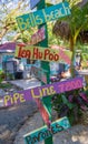 Tamarindo, Costa Rica, June, 26, 2018: Outdoor view of informative signs in wooden and plastic posts in a sunny day in
