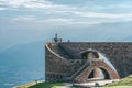 Tamaro, Switzerland - August 5,2019: Tourists on Chapel Santa Maria degli Angeli on top of mounte Tamaro Royalty Free Stock Photo