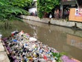 Tambora, jakartGarbage piled up in rivers near densely populated areas