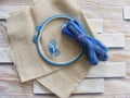 Tambour with threads for embroidery blue color and pacifiers Royalty Free Stock Photo
