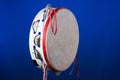 Tambourine Isolated on Blue Royalty Free Stock Photo