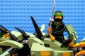 Lego Ninjago Movie. The Green Ninja standing on Green Ninja Mech Dragon