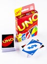 Two decks of UNO game cards with UNO game box on white background Royalty Free Stock Photo
